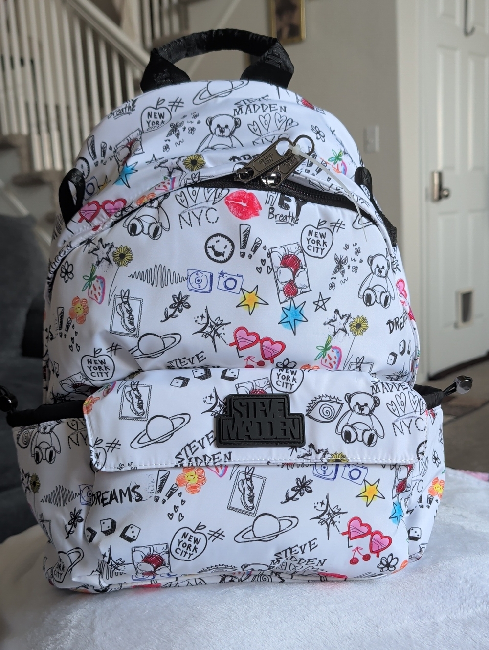 Steve Madden Kids White Doodle Backpack with Multicolor Accents